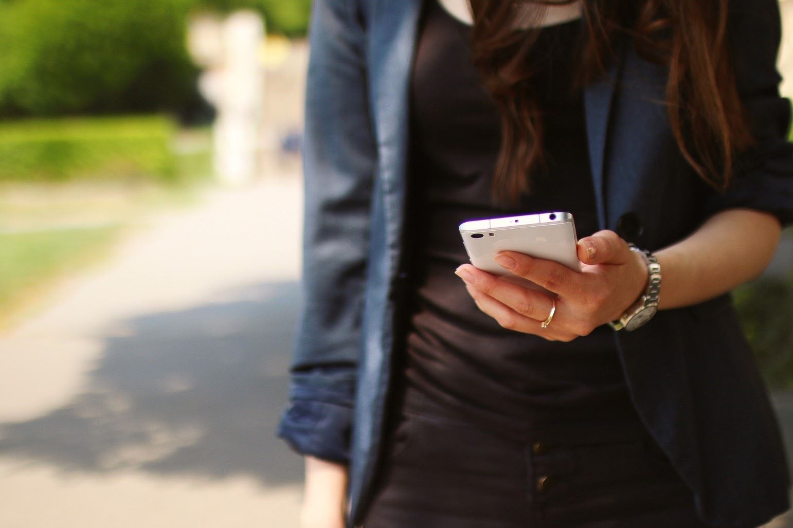 person looking at a cell phone